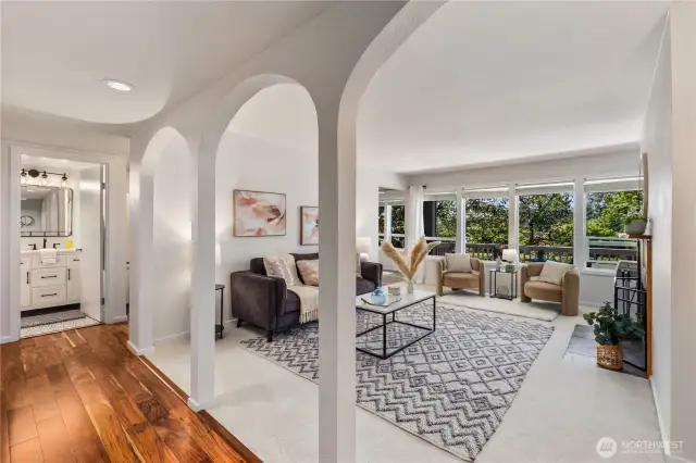 Spacious entry and living room with new carpet and fresh paint throughout