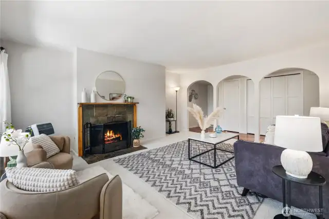 Built in spaces on either side of the fireplace allow for creative decorating