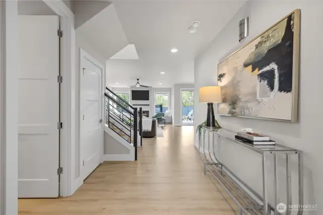 Spacious entry with elegant flooring and natural light.