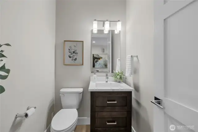 Convenient half bath location for your guests.