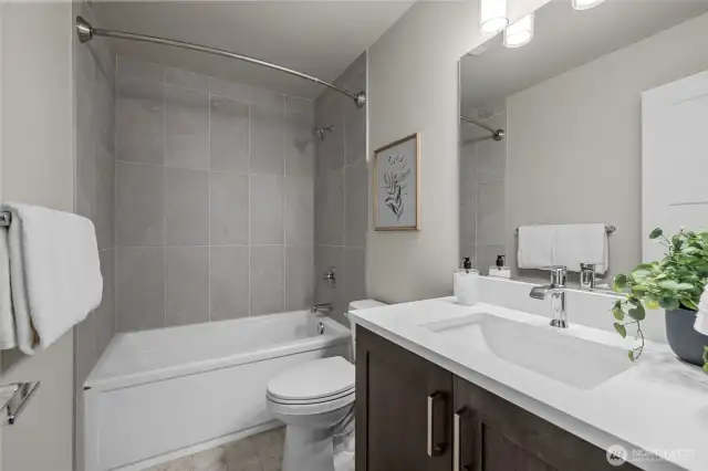 Junior suite bath with soaking tub and upgraded finishes.
