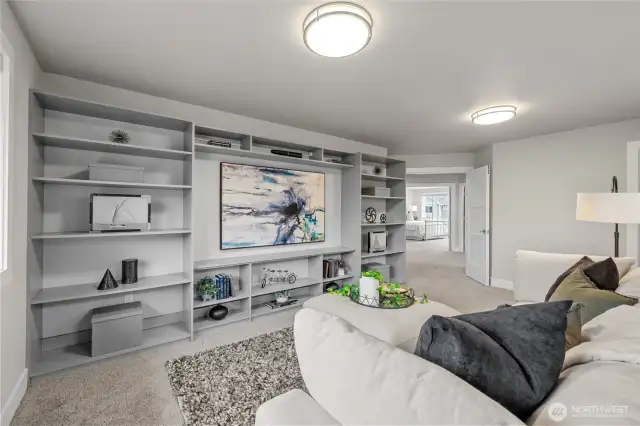 Bonus room with custom shelving – fits up to a 90” TV!