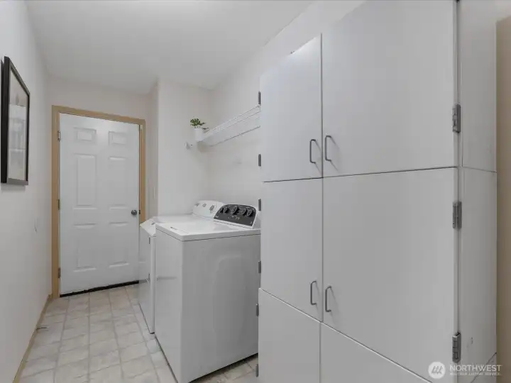 Washer and dryer and entrance to garage