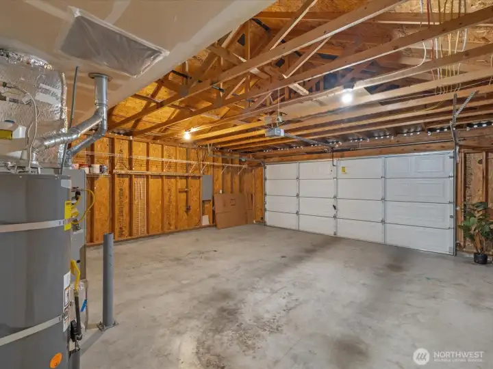 2 car garage with storage on sides and above