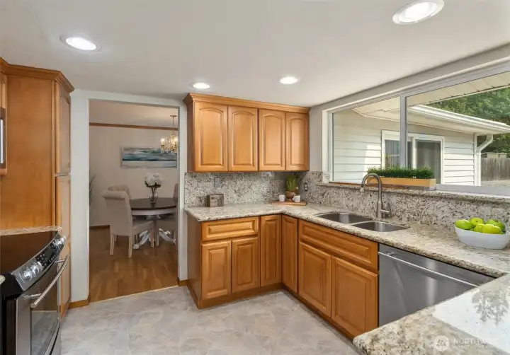 Stainless steel appliances and granite.