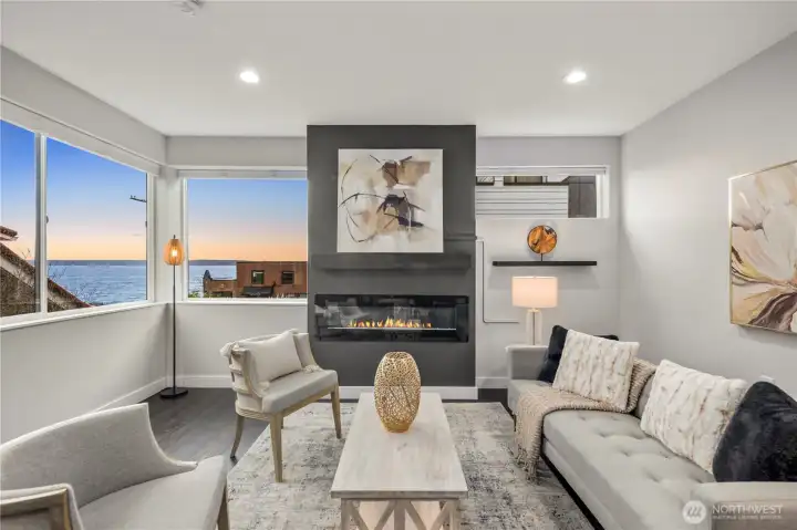 Spacious living area with fireplace and views