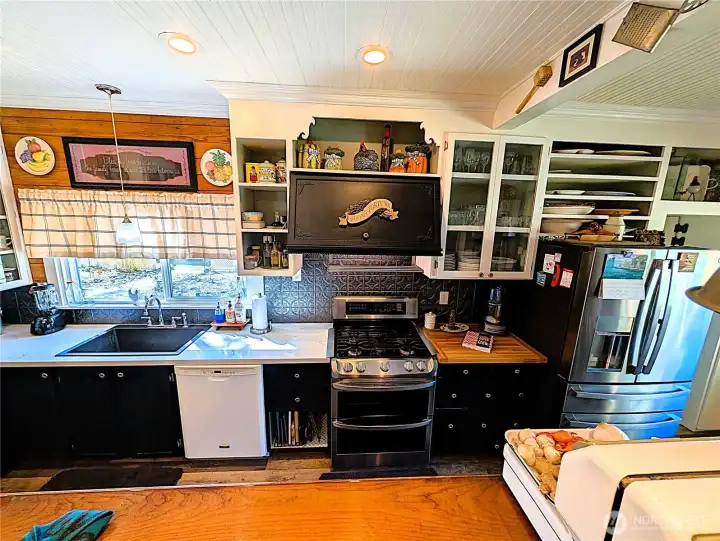 Remarkable cabinetry & custom hood fan