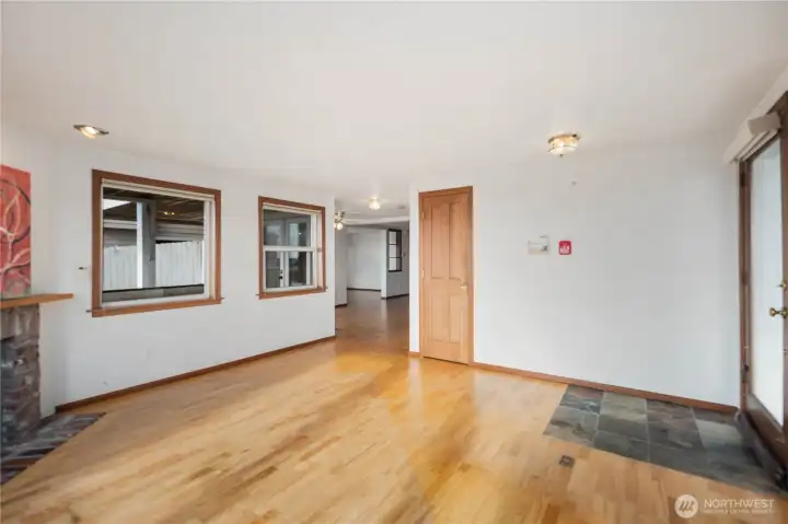 living room and entrance to the right