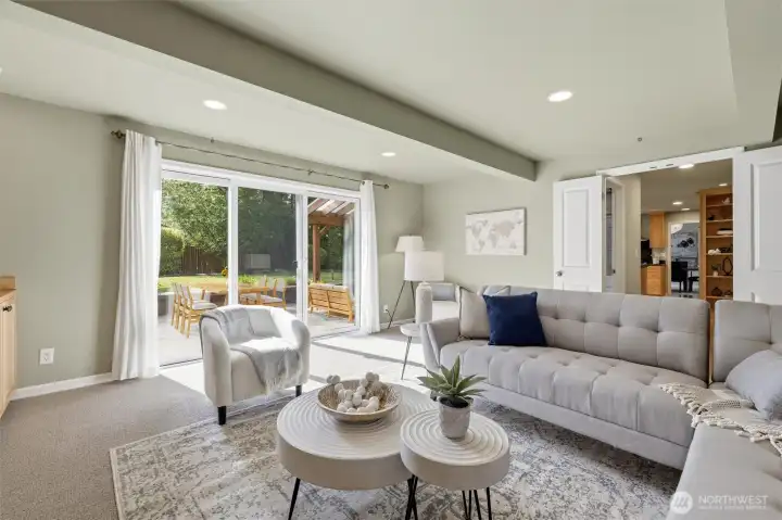 Spacious family room designed for gathering, relaxing, and effortless indoor-outdoor living