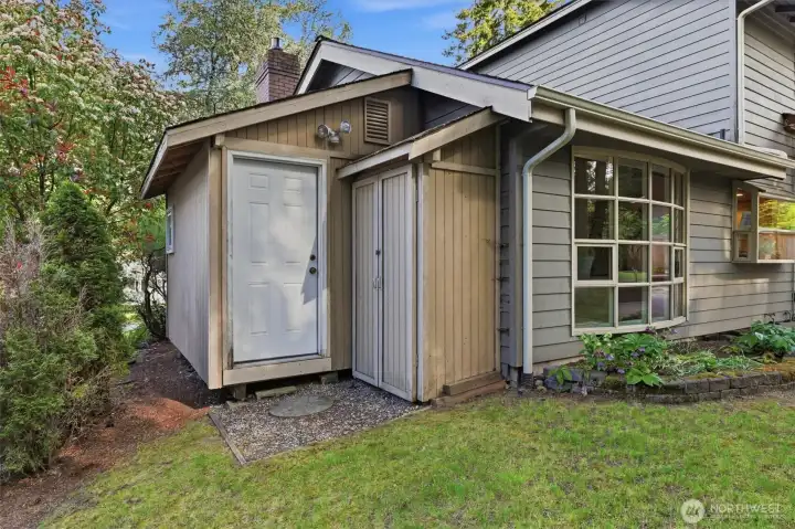 Detached shed/workout studio offers versatile flex space for fitness, creative pursuits, or remote work