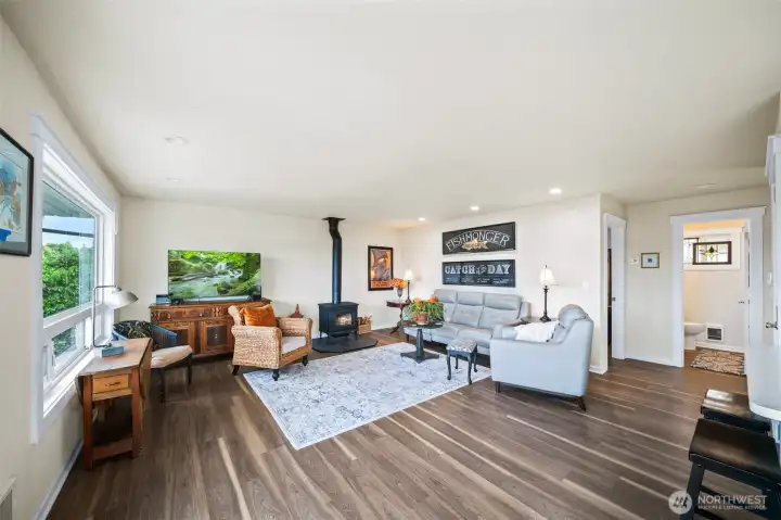 Easy floor plan with no wasted space. Sturdy flooring for your sandy beach feet. Cozy wood stove for chilly nights