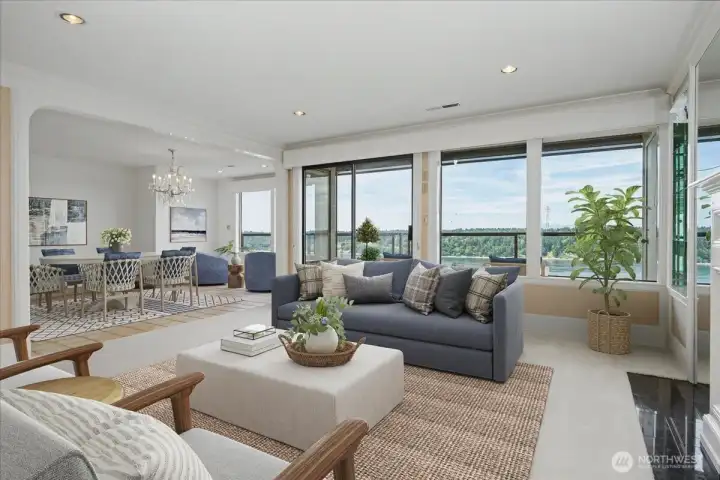 Windows have electronic blinds to shield the interior from the intense summer sun as well as Hunter Douglas shades.  An outdoor awning also provides protection while enjoying the lanai.   A built in sound system will be enjoyed by movie watchers.  Virtually staged.