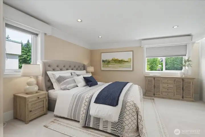 Plenty of space for a California king-size bed & dressers in this primary bedroom.  All closets in the condo are cedar-lined and well-lit.  Virtually staged.