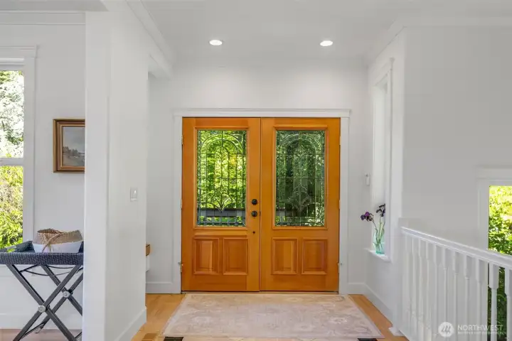 The views out of the glass doors and all of the windows are green and lush.