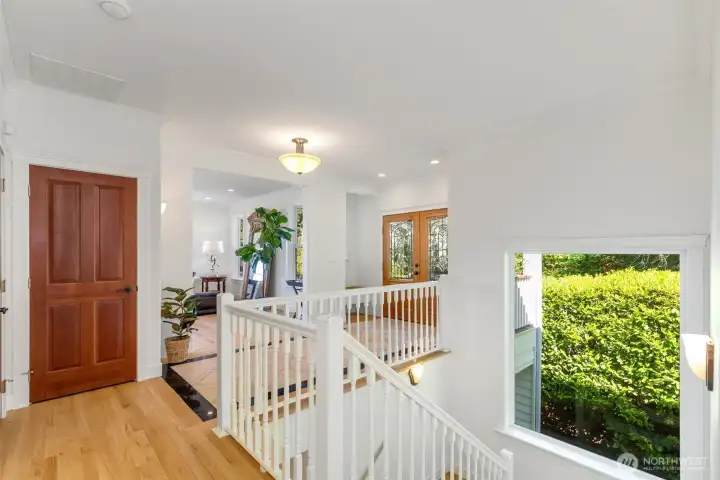 The light and open stairway at the center of the home.