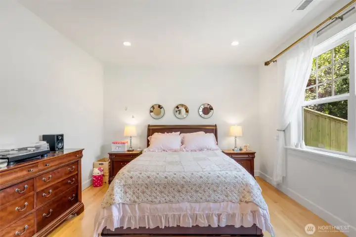 The third bedroom on this level looks out on the side yard and gets great light.