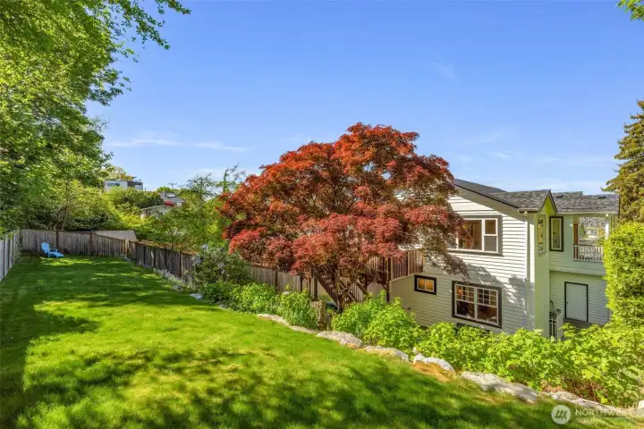 Wonderful yard space—perfect for a dog run, play, or outdoor games! This area is actually made up of two additional parcels that have been incorporated into the yard.