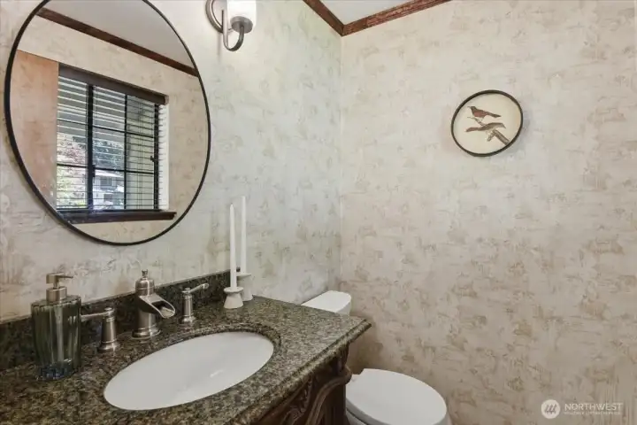Lower level powder room. Lower level powder room.