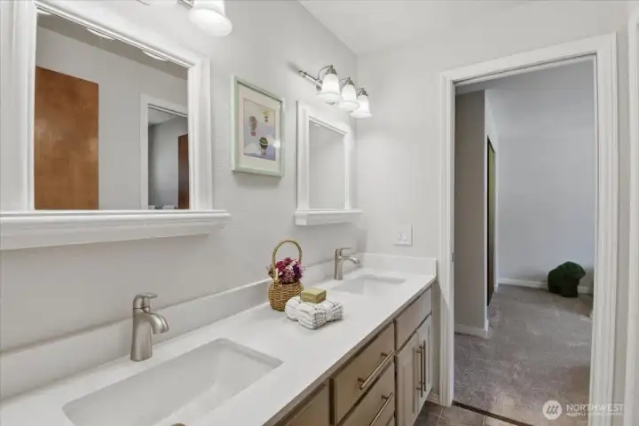 Jack and Jill bathroom, with tile floors, double sinks, separate shower and toliet. Jack and Jill bathroom, with tile floors, double sinks, separate shower and toliet.
