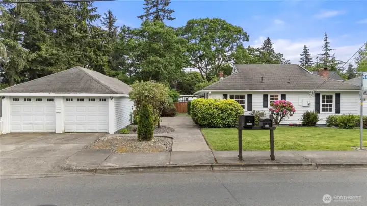 Front of Home from 100th St SW. 4 Bedroom, 1.75 bath 1,452 SF home with HUGE detached garage