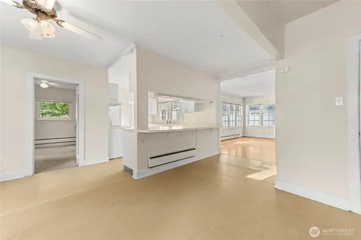 Entry including dining area, kitchen, living room and access to one bedroom.