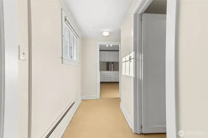 Hallway to back of house looking at kitchen