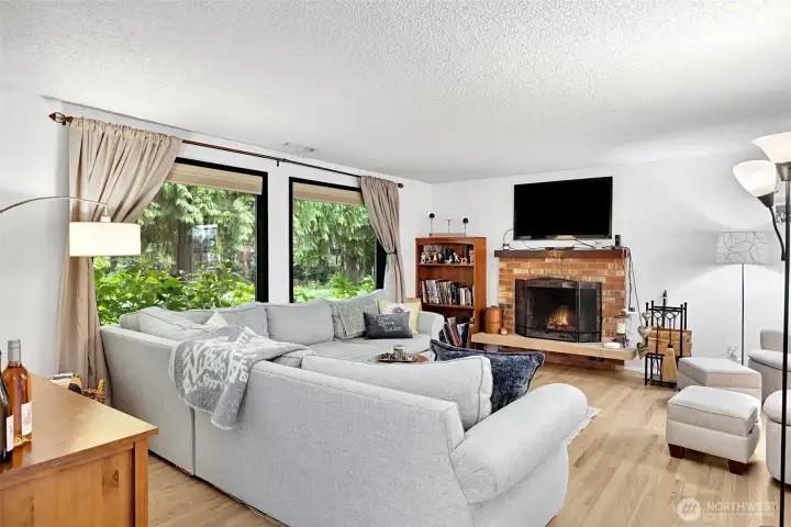 Living room with wood burning fireplace