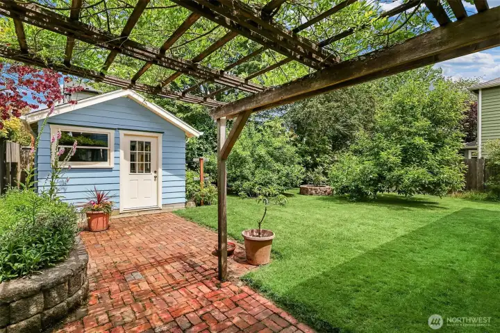 A lovely gazebo and large shed that can be converted into an office or studio