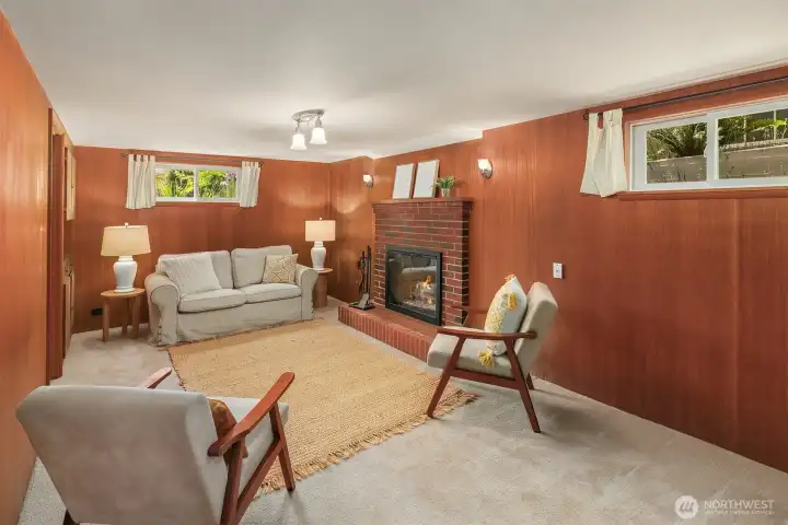 Lower level bedroom with wood fireplace