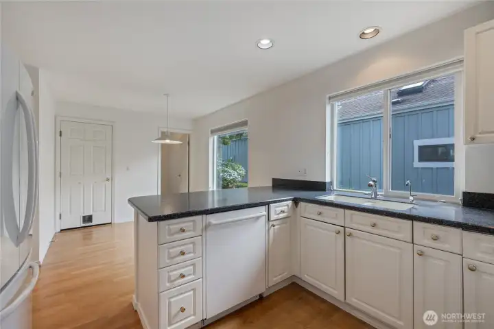 Door on left leads to garage, door on right to the laundry room