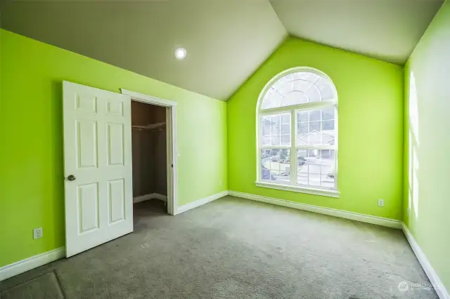 Upstairs bedroom with sweeping views of the front yard