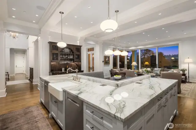 Beautiful natural light fills this room. The doors open fully creating a seamless entertaining space both inside and out.  Incredible, private, green golf course vistas infuse your day with fun and joy.