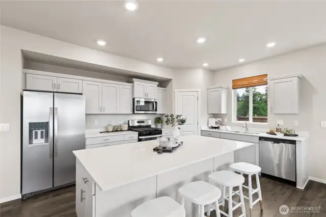 Photos are for representational purposes only.  Colors and finishes may vary. Refrigerator is a builder option.
