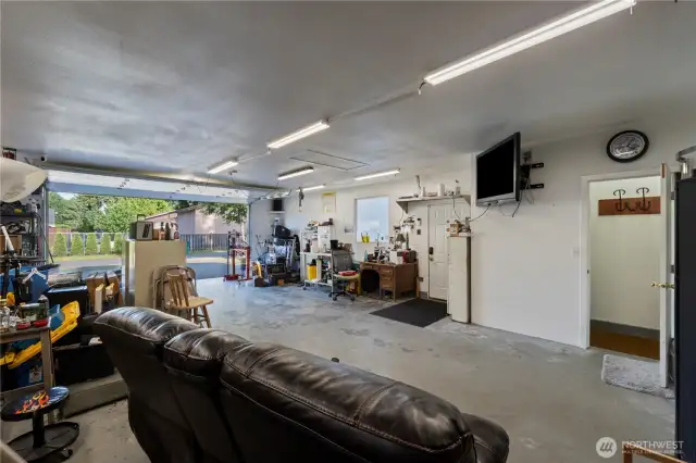 Versatile Shop  A 24'x36' wired and plumbed shop, ready for studio conversion, opens up possibilities for countless projects or additional living space.