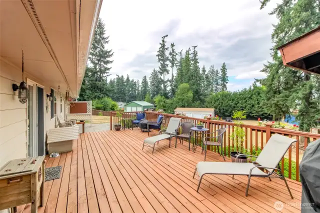 Huge deck with covered hot tub!