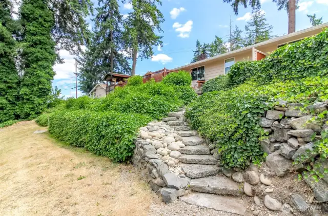 Stairs down to the lower yard