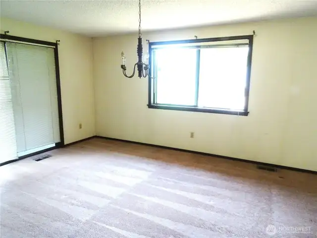 A view of the dining area from the kitchen.
