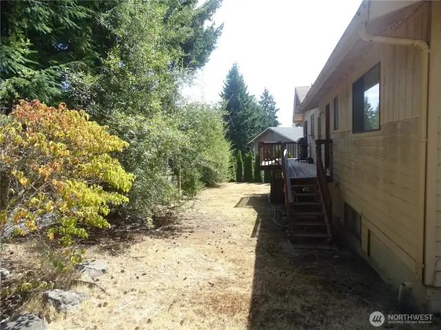 A view of the deck in the backyard.
