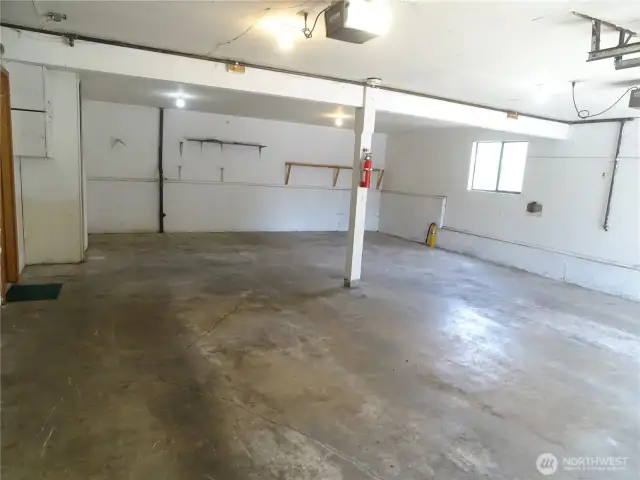 A car enthusiast's dream garage! Parks four vehicles.