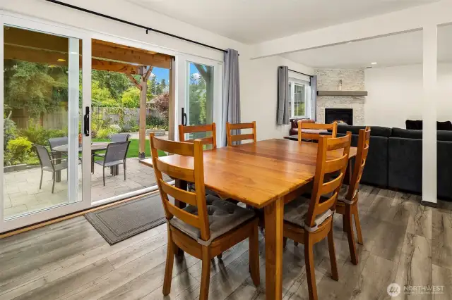 Dining room with upgraded glass paneled doors.