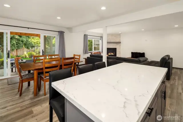 Kitchen looking into living space with island seating.