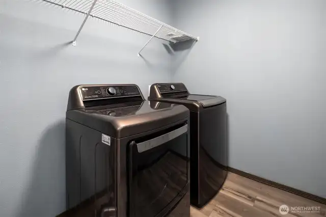 Laundry room with extra storage space.