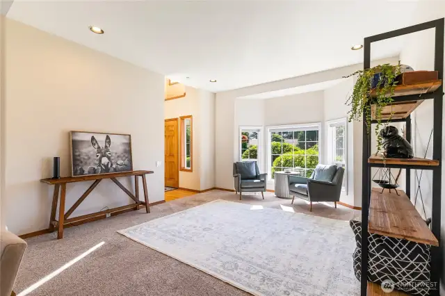 2nd living room space and dinning room to the left as you enter the home.
