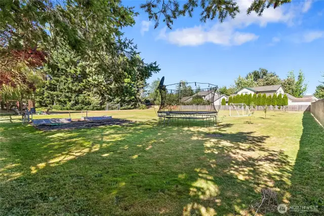 2nd area beyond the backyard for playing. Garden boxes included