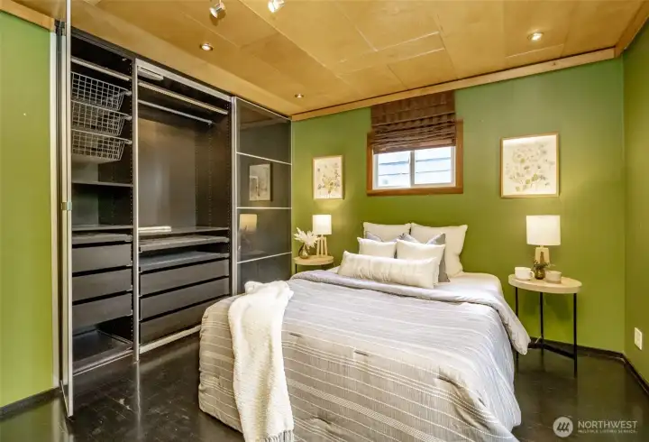 Look at the special ceiling woodwork and closet