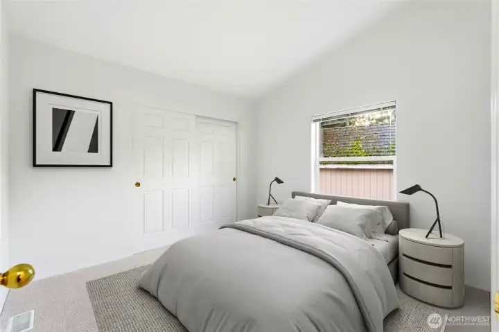 Utility room with door leading out to back deck/yard.