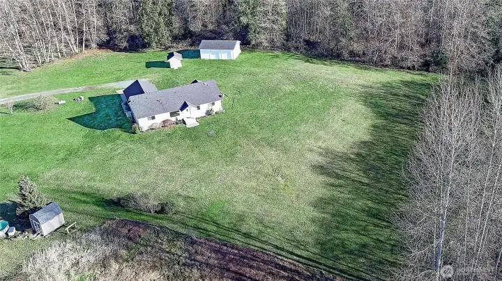 Aerial view of your property and surrounding trees creating privacy and tranquility.