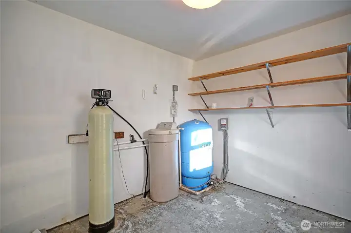 Private well with a water softening system.