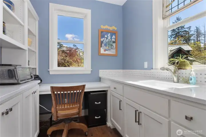 Office and pantry on main floor with a bay view