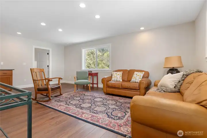 Flex room or bedroom, has a sink hookup and cabinet. Could be a game room